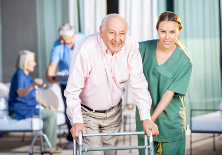 lady nurse helping elderly person